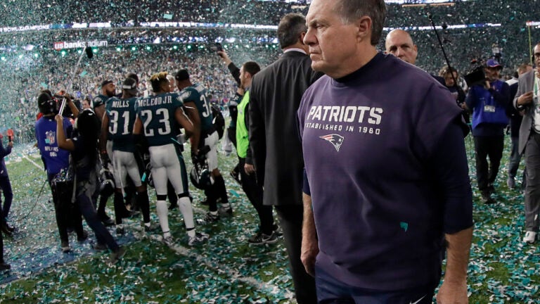 New England Patriots head coach Bill Belichick walks the sideline