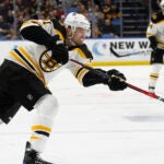 Boston Bruins forward Rick Nash (61) shoots during the first period of an NHL hockey game against the Buffalo Sabres, Sunday, Feb. 25, 2018, in Buffalo, N.Y. (AP Photo/Jeffrey T. Barnes)