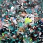 Tom Brady leaves the field after losing to the Philadelphia Eagles, 41-33.