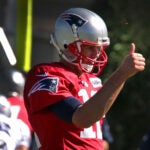Tom Brady gives a thumbs up.