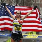 Desiree Linden of the US after crossing the finish line to win the women's division of the 122nd Boston Marathon.