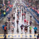 Runners come to the finish line of the 122nd Boston Marathon.