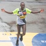 Shadrack Biwott of the United States crosses the finish line in third place for the 2018 and 122nd Boston Marathon for Elite Men's race with a time of 2:18:35 on April 16, 2018 in Boston, Massachusetts. / AFP PHOTO / RYAN MCBRIDERYAN MCBRIDE/AFP/Getty Images