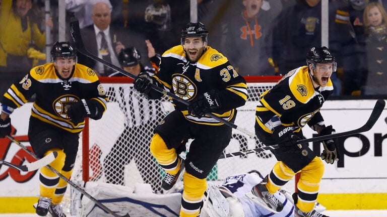 Patrice Bergeron #37, Tyler Seguin #19, and Brad Marchand in 2013 Game 7 comeback vs. Maple Leafs