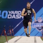 UCLA offensive lineman Kolton Miller runs the 40-yard dash during the NFL football scouting combine, Friday, March 2, 2018, in Indianapolis. (AP Photo/Darron Cummings)