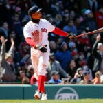 Xander Bogaerts watches his grand slam during the second inning against the Rays at Fenway Park on Saturday.