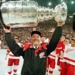 Detroit Red Wings head coach Scotty Bowman raises the Stanley Cup over his head after Detroit defeated the Philadelphia Flyers to win the cup in Detroit, June 7, 1997. Bowman will soon coach in his 2,000th NHL game, a mind-boggling feat. But the 67-year-old coach, in his 29th season, just shrugs off the milestone like it's just another one of his 1,000-plus wins. (AP Photo/Tom Pidgeon)