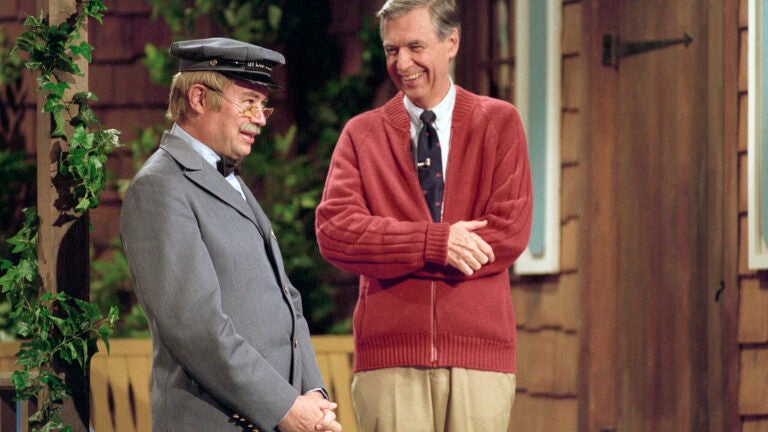 Fred Rogers and David Newell, as Speedy Delivery's Mr. McFeely, filming an episode of Mister Rogers' Neighborhood.