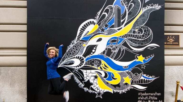 Pretend you can fly at this Boylston Street Boston Marathon mural