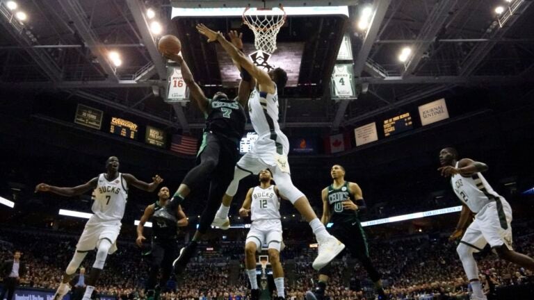 Jaylen Brown shoots during the second half of Game 4 in the Celtics' first-round playoff series against the Milwaukee Bucks on Sunday in Milwaukee. The Bucks won 104-102.