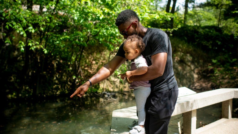 Red Sox outfielder Jackie Bradley Jr. visits the Central Park Zoo with his daughter Emerson on a team off-day on May 7, 2018 in New York City.