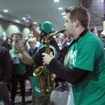 Saxophonist Joe Sparkes performs for a Celtics crowd outside TD Garden.