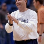 Butler coach Todd Lickliter applaudes his players during practice for the NCAA East Regional basketball tournament Thursday, March 27, 2003, in Albany, N.Y. Butler plays Oklahoma in an East regional semifinal game on Friday, March 28. (AP Photo/Kevin Rivoli) Library Tag 03282003 Sports