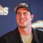 Quarterback Ryan Leaf smiles as he answers questions at a news conference Sunday, July 26, 1998, in San Diego. Leaf will begin practicing with the San Diego Chargers Monday after signing a contract that could be worth more than $31.25 million for five years. (AP Photo/Denis Poroy)