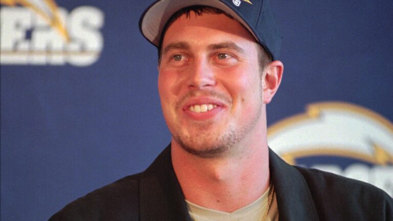 Quarterback Ryan Leaf smiles as he answers questions at a news conference Sunday, July 26, 1998, in San Diego. Leaf will begin practicing with the San Diego Chargers Monday after signing a contract that could be worth more than $31.25 million for five years. (AP Photo/Denis Poroy)