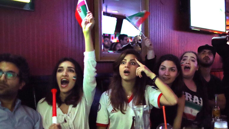 Cambridge- 06/15/18- Dozens of Iranian soccer fans squeezed into the Phoenix Landing bar on Mass. Ave to watch the World Cup Soccer match between Morocco and Iran on several large tv's in the bar. Photo by John Tlumacki/Globe Staff(lmetro)