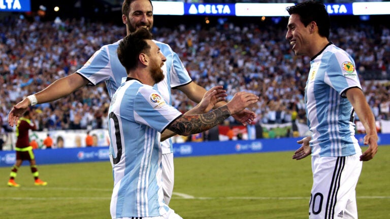 Lionel Messi and his Argentinian teammates celebrate a goal at Gillette Stadium in 2016.