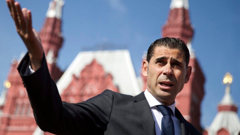 Fernando Hierro gestures as he speaks with the media at Red Square in Moscow, Russia. The Spanish soccer federation says former player Fernando Hierro will take over the national team during the World Cup.