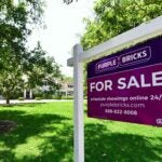 US-economy-home-sale-sign