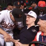 Ted Williams talks to Cal Ripken Jr. at the 1999 All-Star Game.
