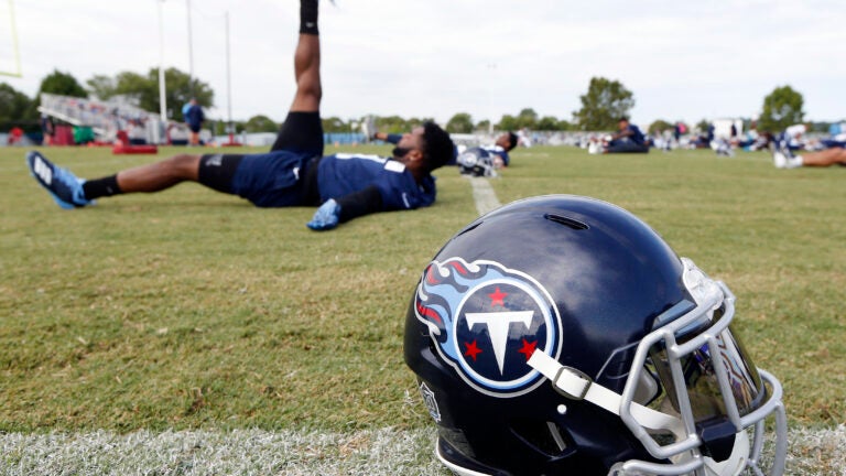 Tennessee Titans defensive back Malcolm Butler stretches during training camp, 2018.