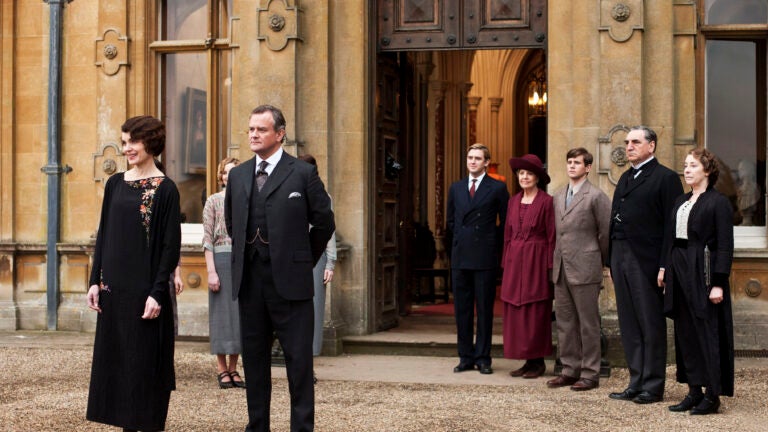 This undated publicity photo provided by PBS shows, from left, Elizabeth McGovern as Lady Grantham, Hugh Bonneville as Lord Grantham, Dan Stevens as Matthew Crawley, Penelope Wilton as Isobel Crawley, Allen Leech as Tom Branson, Jim Carter as Mr. Carson, and Phyllis Logan as Mrs. Hughes, from the TV series, "Downton Abbey."