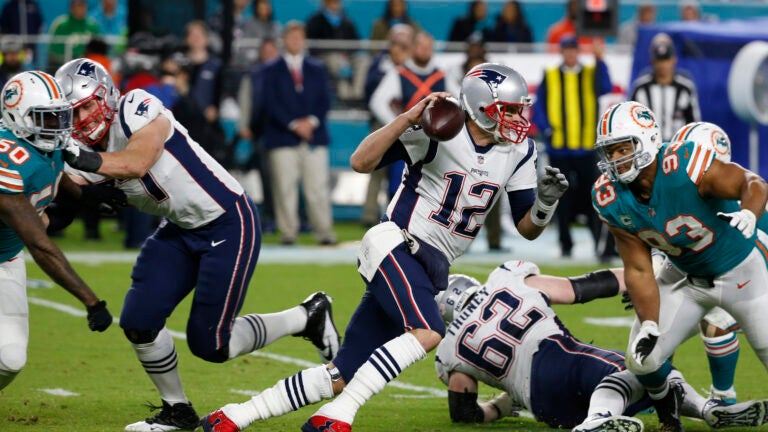 New England Patriots quarterback Tom Brady (12) runs the ball, during the second half of an NFL football game against the Miami Dolphins, Monday, Dec. 11, 2017, in Miami Gardens, Fla. (AP Photo/Wilfredo Lee)