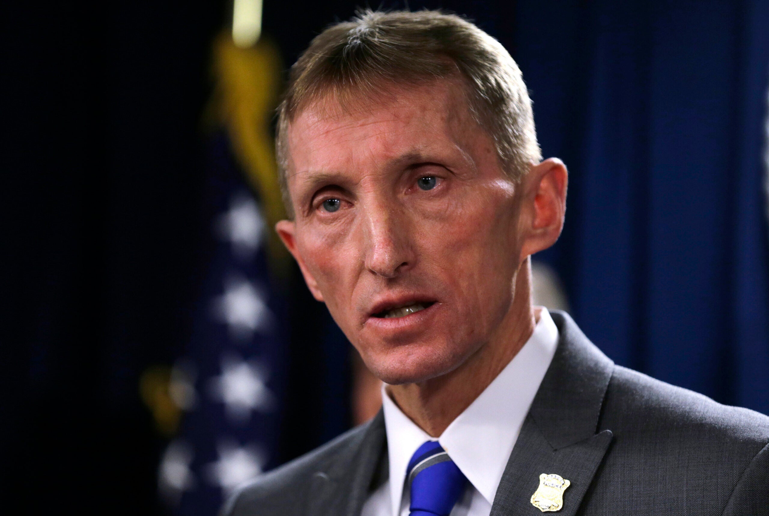 Boston police confiscate four guns, arrest four