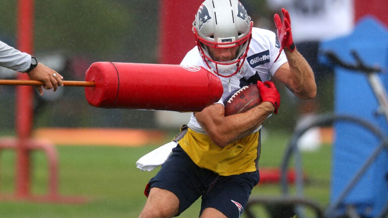 Morning sports update: Why Julian Edelman wears a bright yellow shirt at  Patriots practice