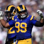 Los Angeles Rams defensive tackle Aaron Donald tries to fire up the crowd during a game against the Seattle Seahawks on Sept. 18, 2016.