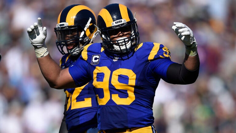 Los Angeles Rams defensive tackle Aaron Donald tries to fire up the crowd during a game against the Seattle Seahawks on Sept. 18, 2016.