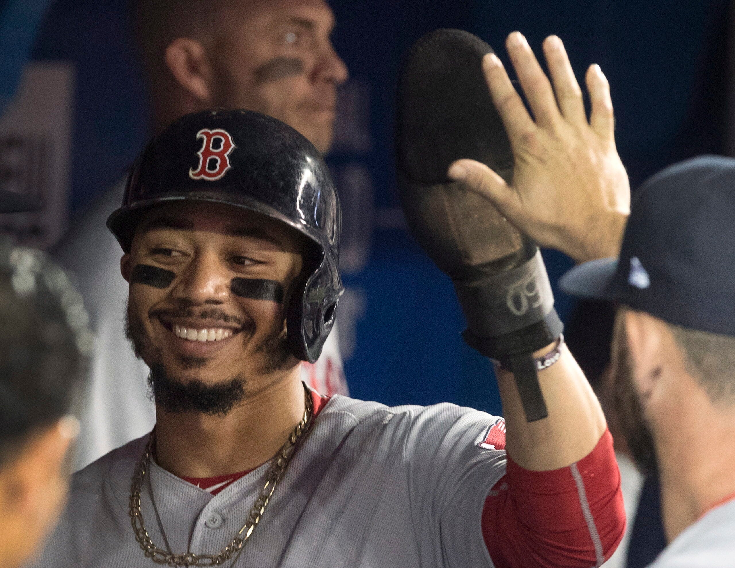 Boston Red Sox superstar Mookie Betts hits a 3-run home run
