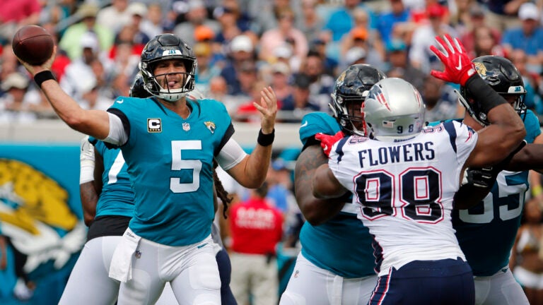 New England Patriots defensive back Jonathan Jones (31) walks back to the  locker room at the end of the second quarter during an NFL football game  against the Miami Dolphins Sunday, Sept.