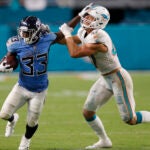 Dion Lewis of the Titans against Kiko Alonso of the Dolphins.
