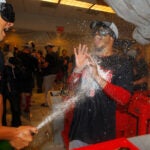 Red Sox players celebrate 2018 A.L. East win.