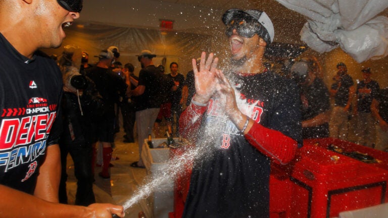 Red Sox players celebrate 2018 A.L. East win.