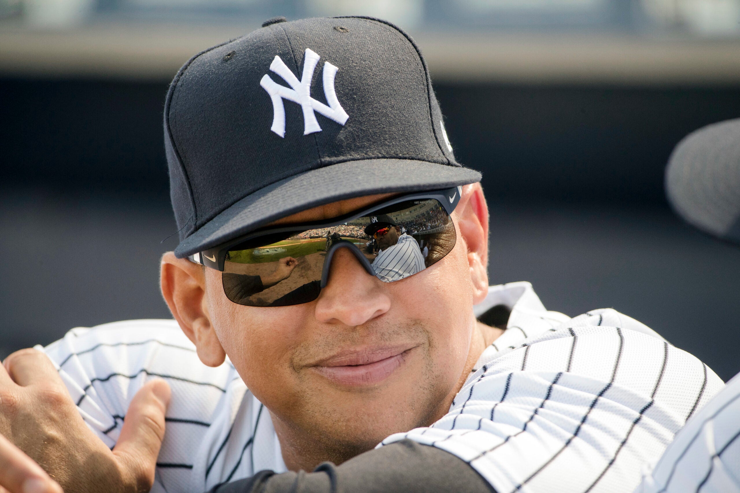 Alex Rodriguez works at Wahlburgers after losing a Red Sox bet to