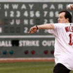 Andris Nelsons, the music director of the Boston Symphony Orchestra, throws out the first pitch before a game in June, 2013.
