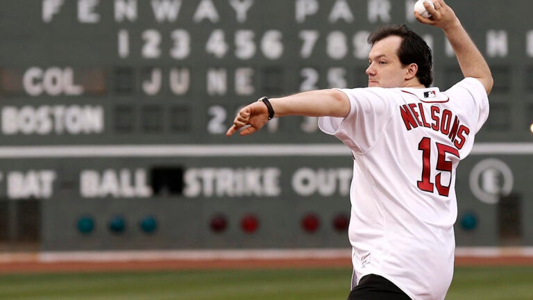 Andris Nelsons, the music director of the Boston Symphony Orchestra, throws out the first pitch before a game in June, 2013.