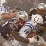 Jarvis Green sacks Peyton Manning during the AFC Championship Game in 2004.