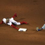 Mookie Betts steals second