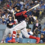 Mookie Betts hits a home run in Game 5 of the 2018 World Series.