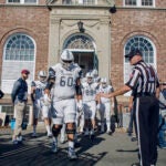 The Columbia University Lions take the field for a game against Dartmouth, in Hanover, N.H.
