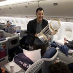 Joe Kelly with the World Series trophy