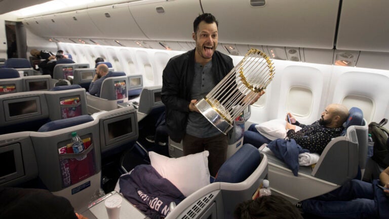 Joe Kelly with the World Series trophy