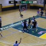 Fitchburg State player hits Nichols College player in the face.