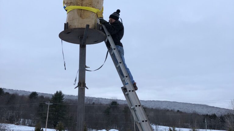 Here's why a Vermont man put up a giant, illuminated middle finger sculpture on his front lawn