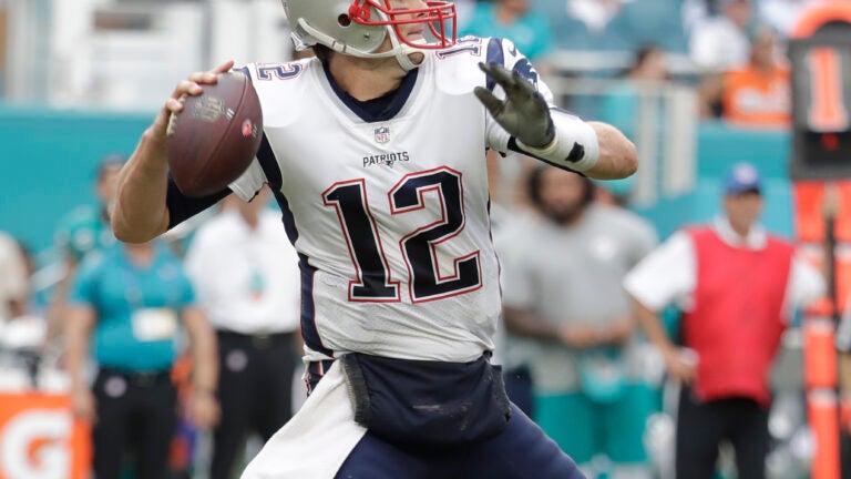 Good sport Tom Brady signs intercepted ball that was his final pass as a  Patriot