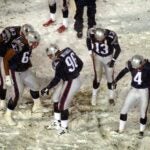 Adam Vinatieri snow Raiders game