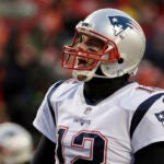 Tom Brady shouts during warm ups prior to the AFC Championship.